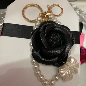 NWT BLACK LEATHER CAMELLIA BAG CHARM KEYCHAIN GOLD ACCENTS